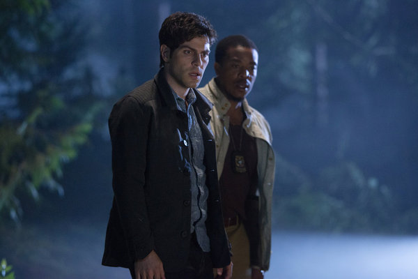 Still of Russell Hornsby and David Giuntoli in Grimm (2011)