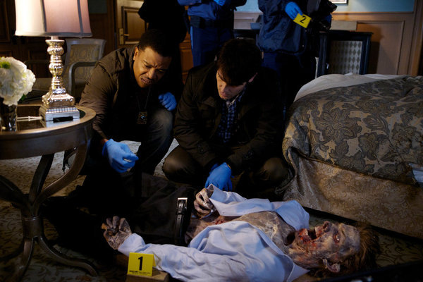 Still of Russell Hornsby and David Giuntoli in Grimm (2011)