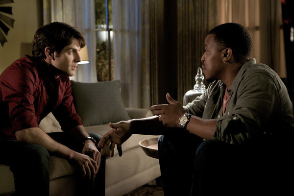 Still of Russell Hornsby and David Giuntoli in Grimm (2011)