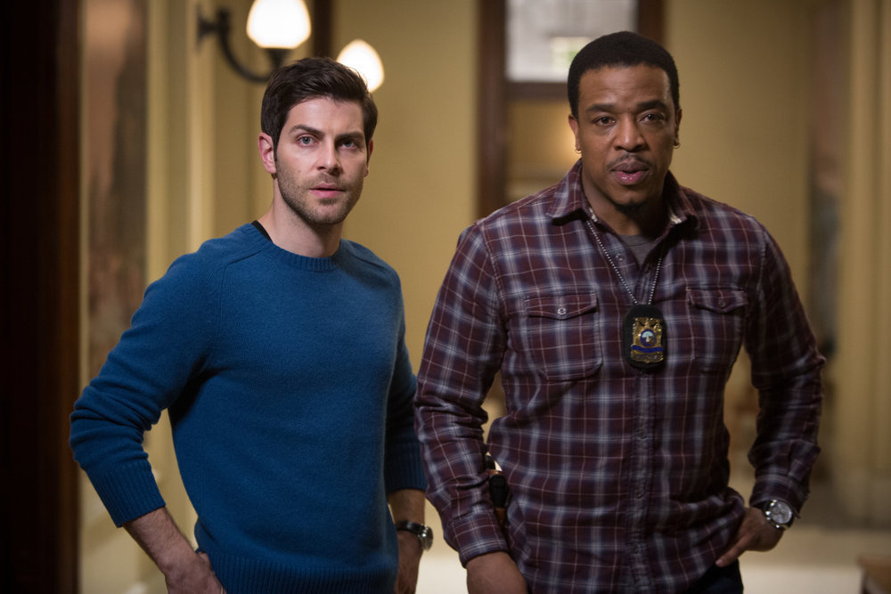 Still of Russell Hornsby and David Giuntoli in Grimm (2011)