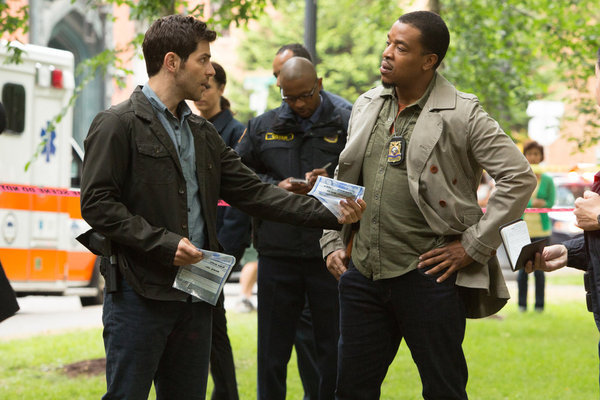 Still of Russell Hornsby and David Giuntoli in Grimm (2011)