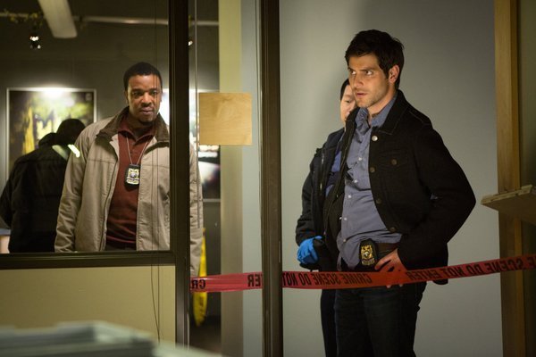 Still of Russell Hornsby and David Giuntoli in Grimm (2011)