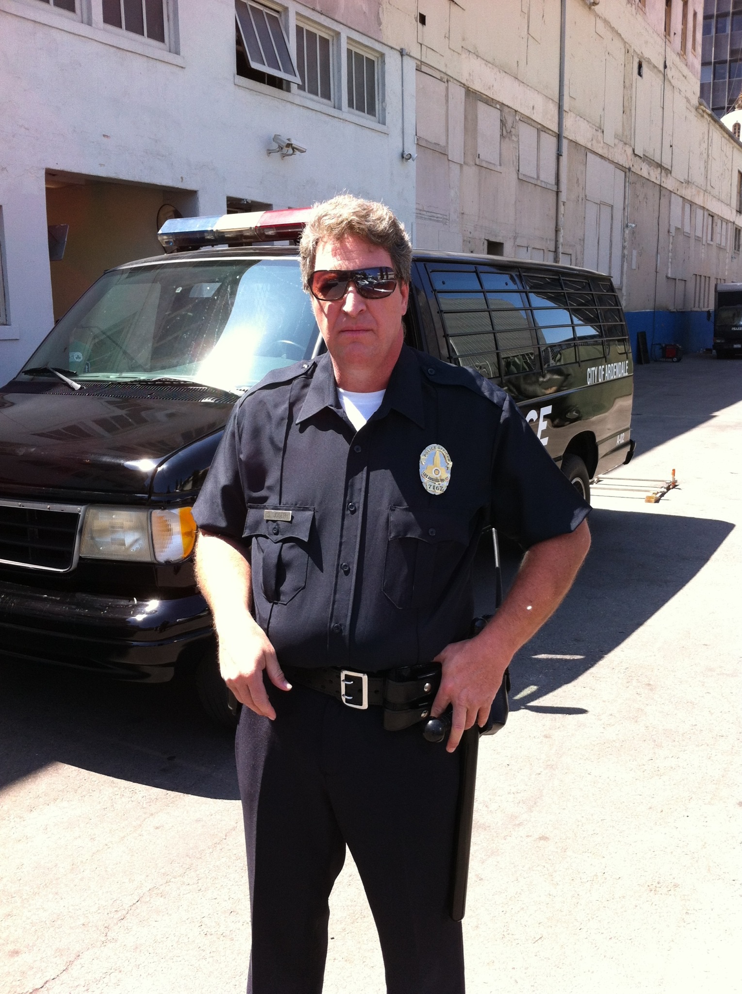 Paul Rose, Jr., as Officer Scott Joseph, on the set of Damn Foreigners.