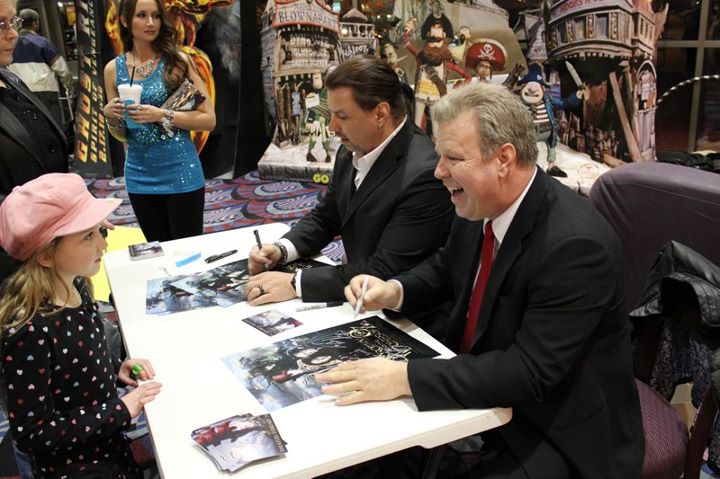 Signing autographs with best friend Al Snow. In other words, he was signing autographs, and I would get his overflow, lol.