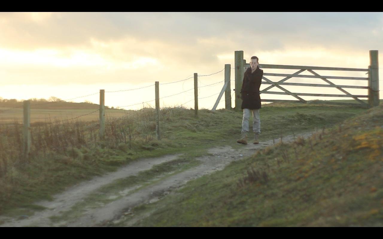 Tom Grace as Andy in Beneath a Neon Tide.