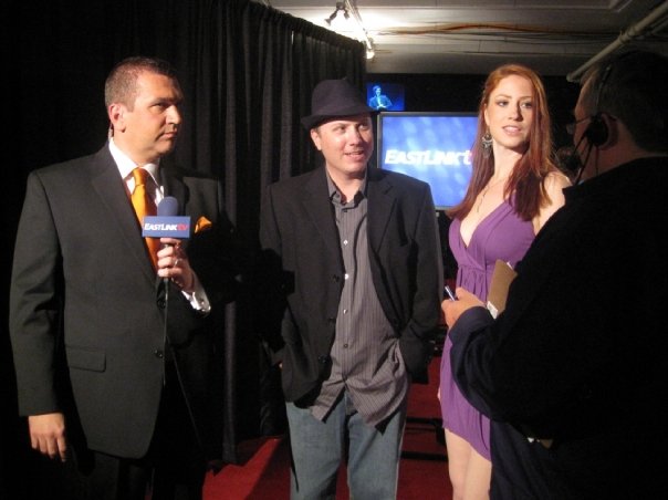 Holly Stevens and Paul Kimball on the red carpet with Scott Squires from Eastlink TV at the Halifax International Film Festival Opening Gala Party in Nova Scotia, Canada.