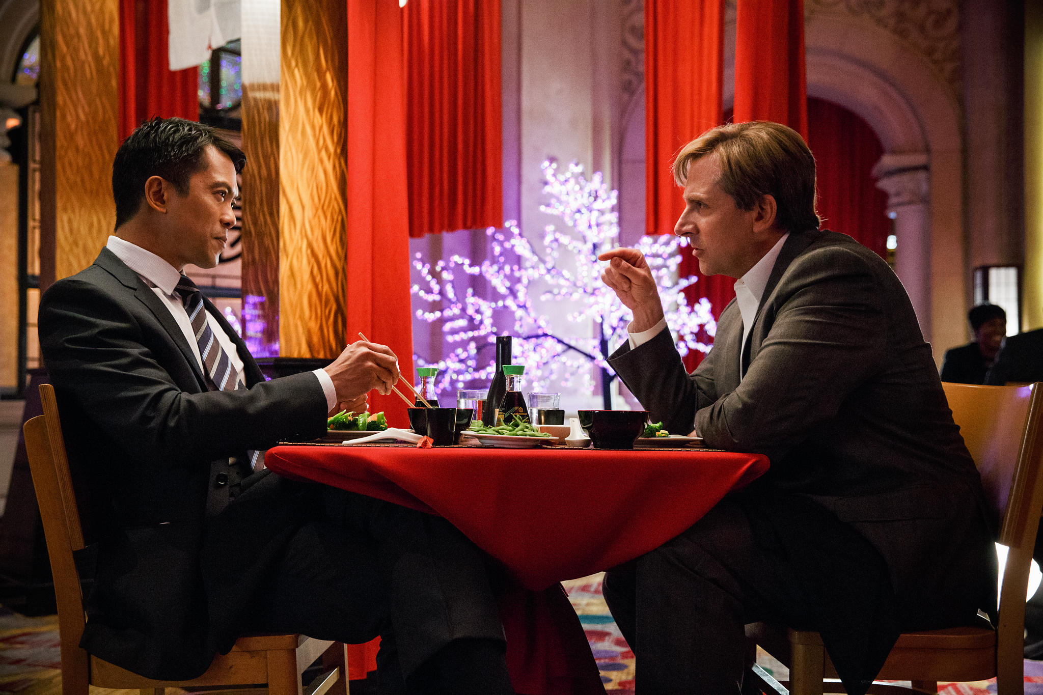 Still of Steve Carell and Byron Mann in The Big Short (2015)