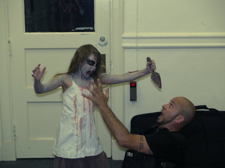 As Dorothy, fighting off the Zombie Hunter Jonas Sherman on Zombie Etiquette epi. 2.