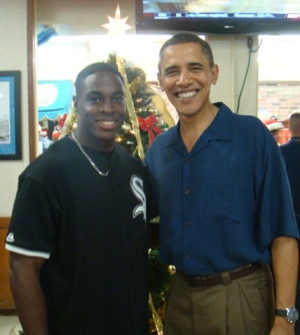 Nick Jones Jr. and President Barack Obama at a Christmas party.