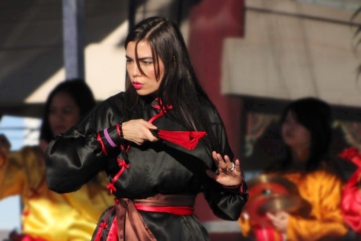 Performing Tai Chi Fan at a Chinese New Year Celebration.