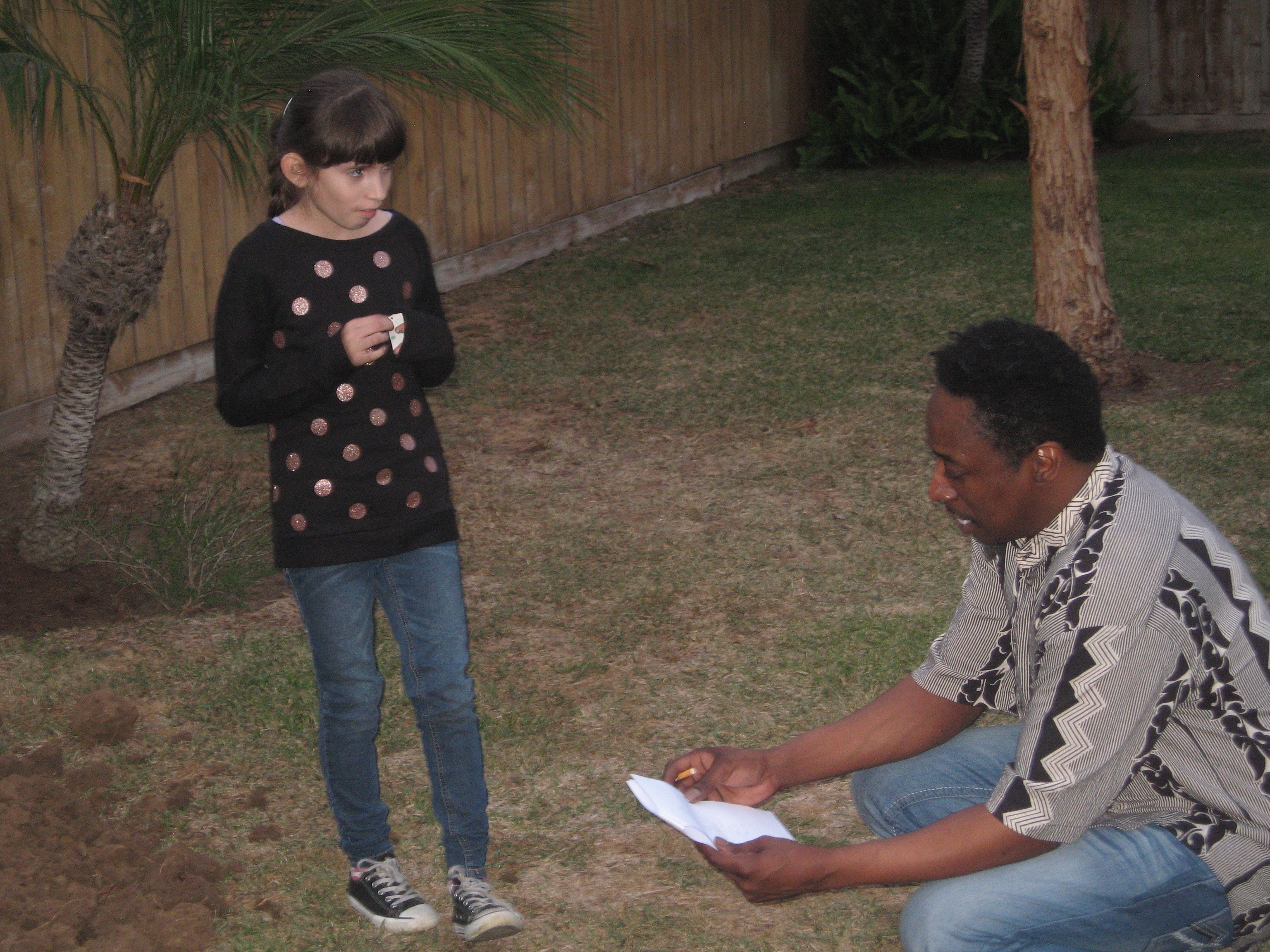 Natalie Miranda running lines with Eddie Griffin on the set of 