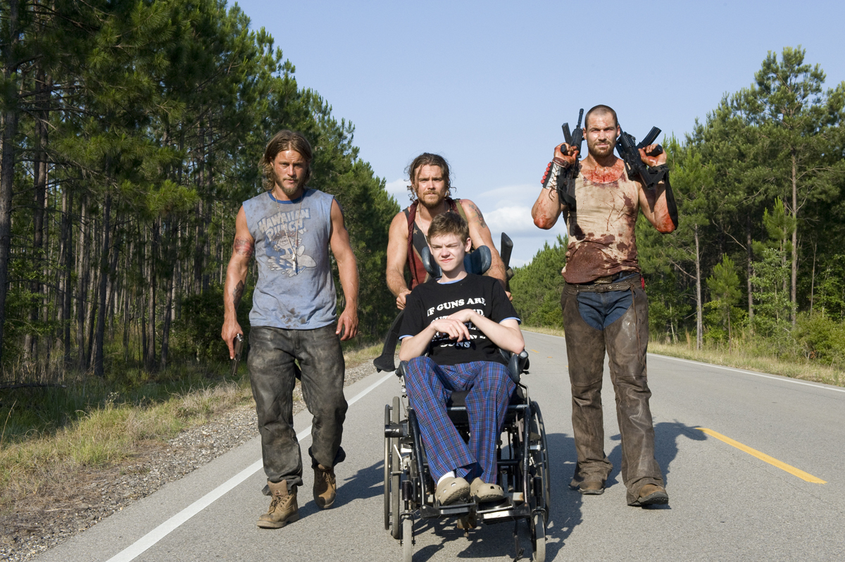 Still of Clayne Crawford, Thomas Brodie-Sangster, Daniel Cudmore and Travis Fimmel in The Baytown Outlaws (2012)