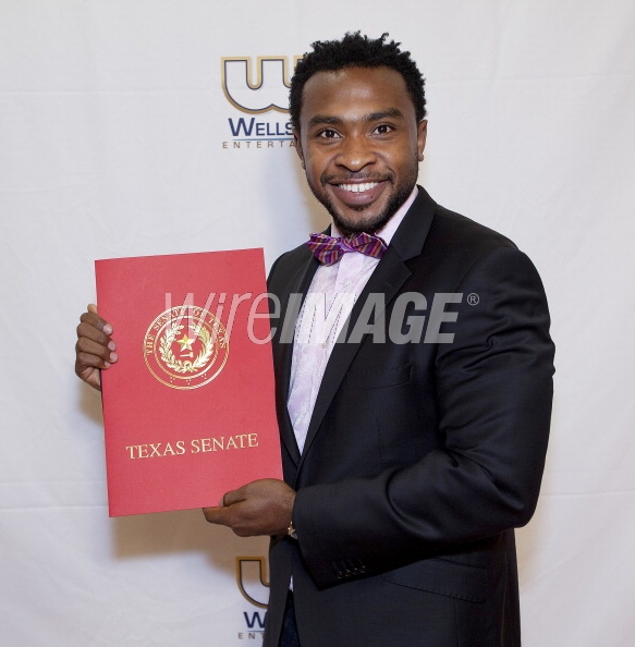 Enyinna Nwigwe with his certificate of recognition from the state of Texas