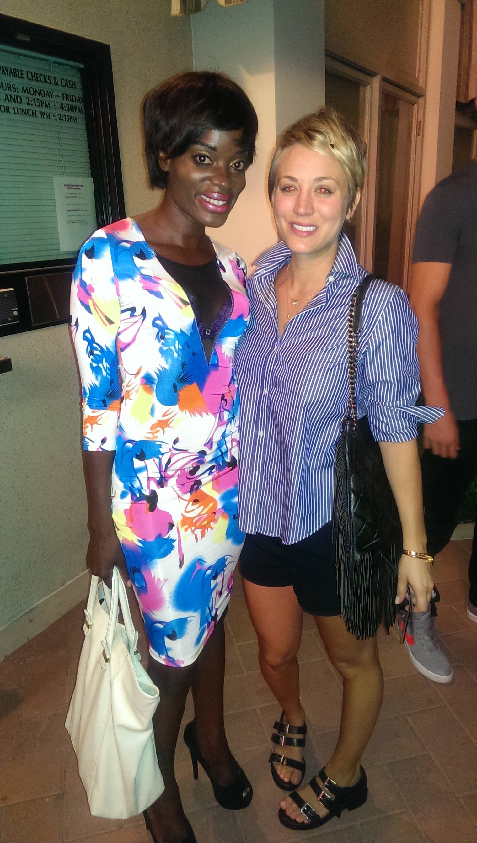 Nimi Adokiye and Kaley Cuoco at the screening of the WEDDING RINGER