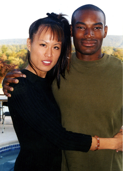 Tyson Beckford with Evelyn Liu
