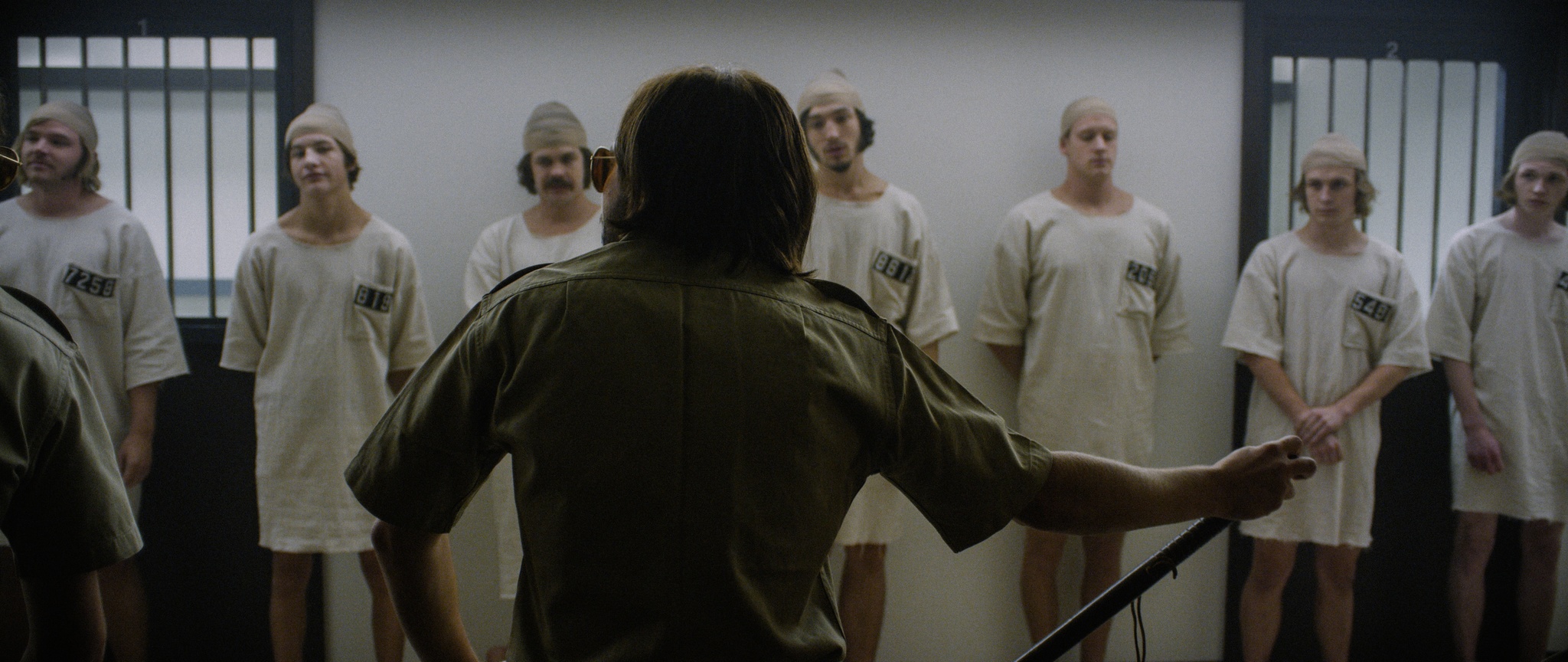 Still of Michael Angarano, Chris Sheffield, Brett Davern, Johnny Simmons, Logan Miller, Ezra Miller, Jesse Carere and Tye Sheridan in The Stanford Prison Experiment (2015)