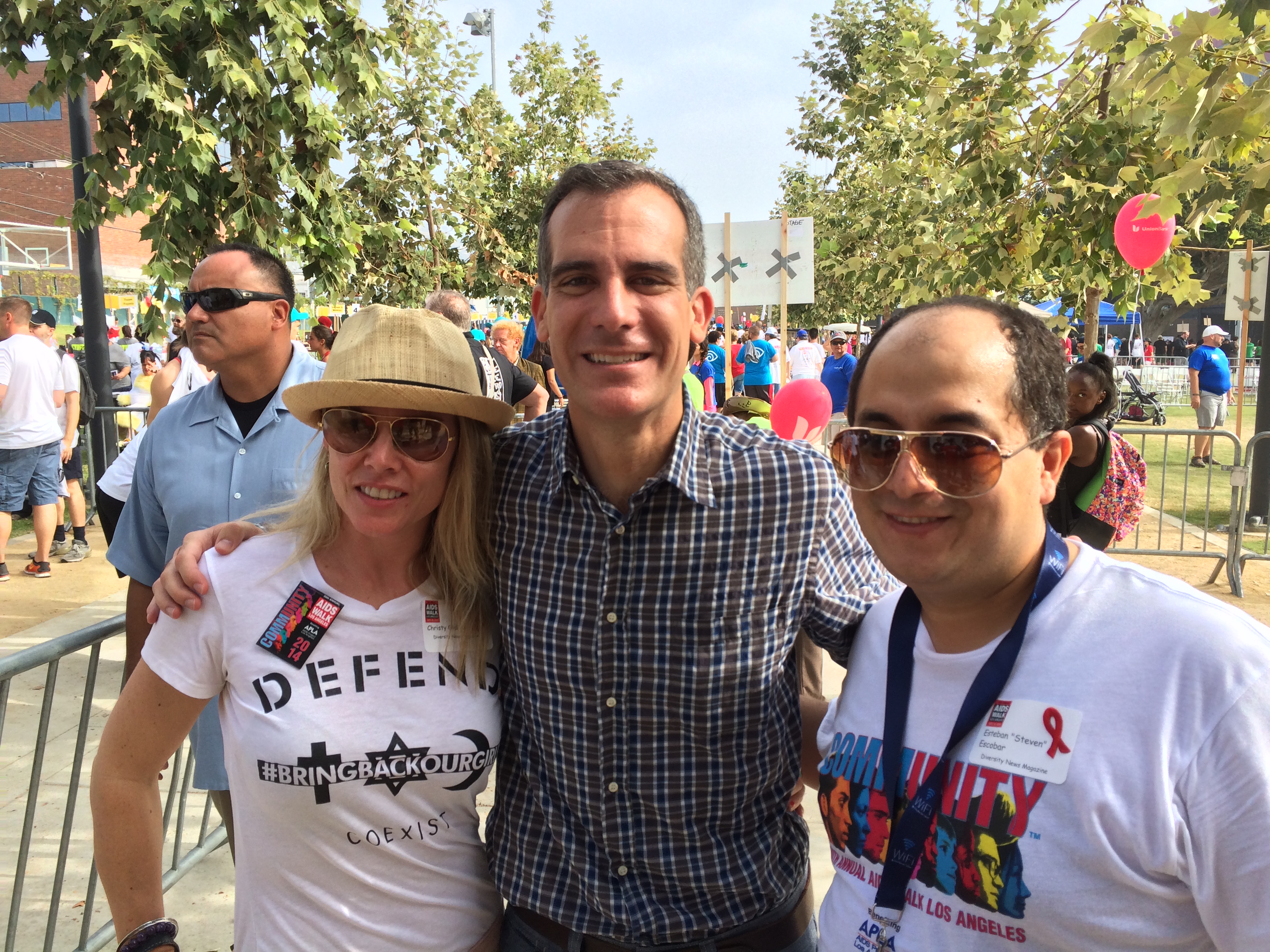 (L-R) Christy Oldham, Los Angeles Mayor Eric Garcetti, Steven Escobar attends at 30th Annual AIDS Walk LA 2014 in West Hollywood, CA.