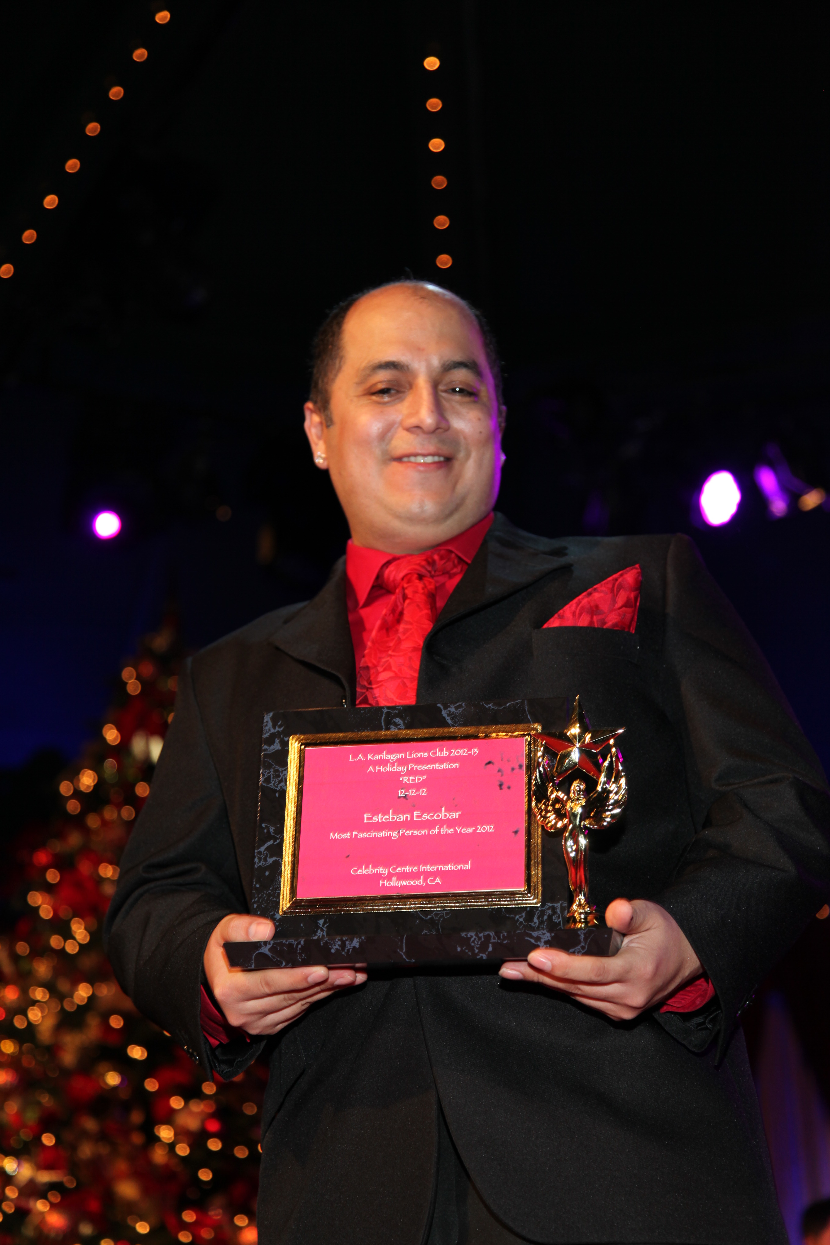 Esteban Steven Escobar with Award for Most Fascinating Person of the Year 2012.