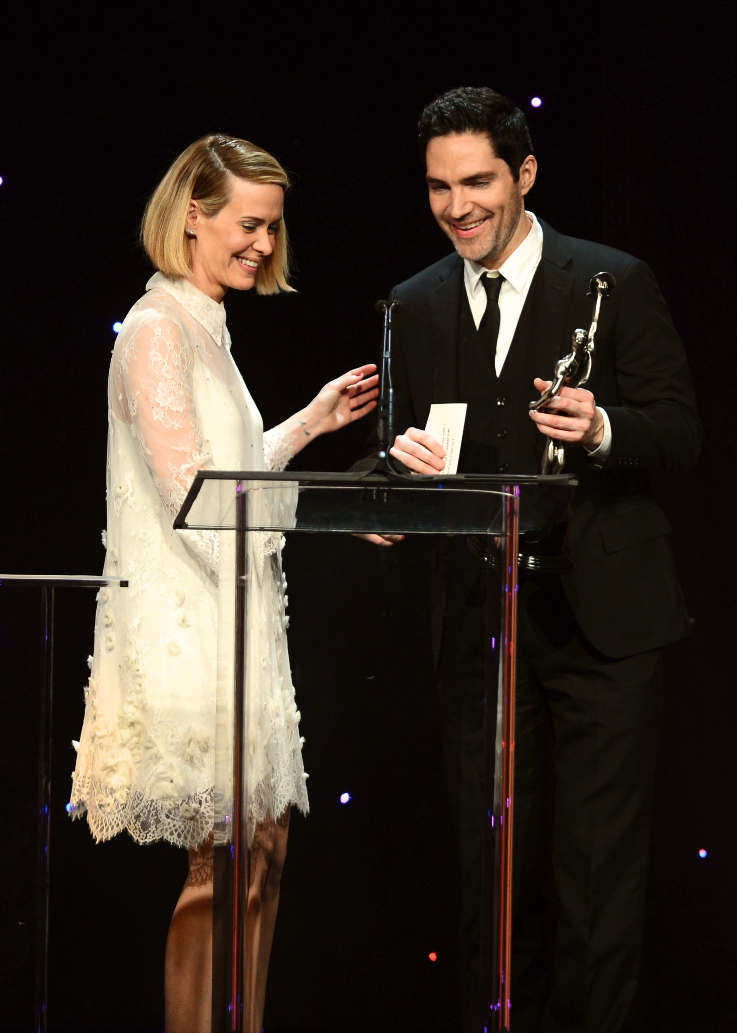 Chris A. Petersen receives his award from actress Sarah Paulson for Best Edited Documentary, 
