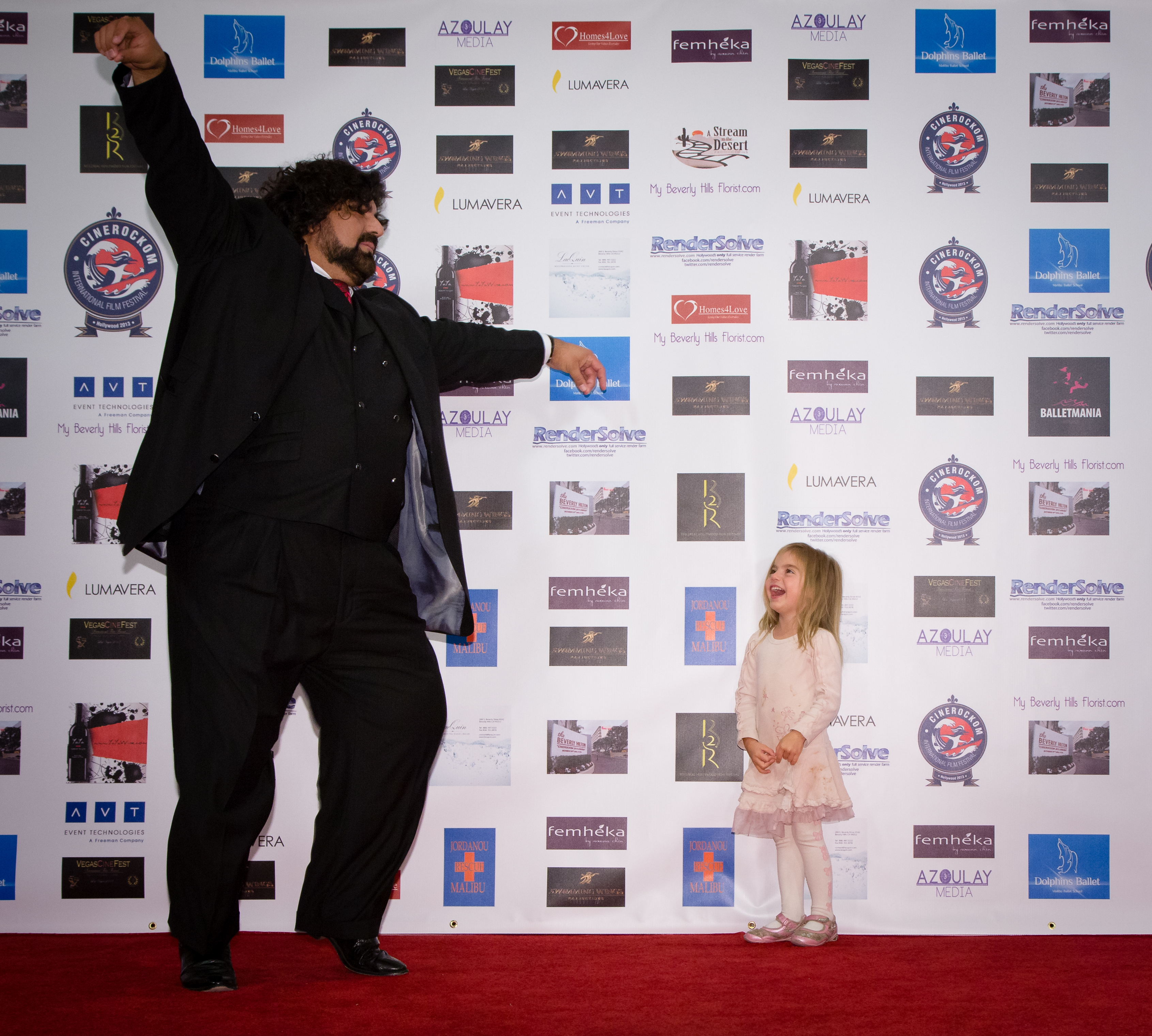 Cinerockom 2013 Hollywood Red Carpet. Beverly Hilton Hotel. Gabriel Schmidt with daughter Victoria Schmidt for their movie premiere