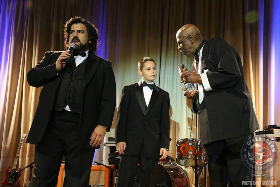 Louis Gossett Jr. and Gabriel Schmidt present the Young Actor Awards, during the Cinerockom Film Festival, held at the Beverly Hilton.