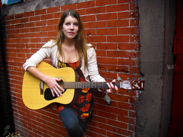 Justine Griffiths with her guitar.