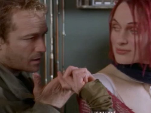 Still of Luke Perry and Dominika Juillet in Jeremiah (2002)