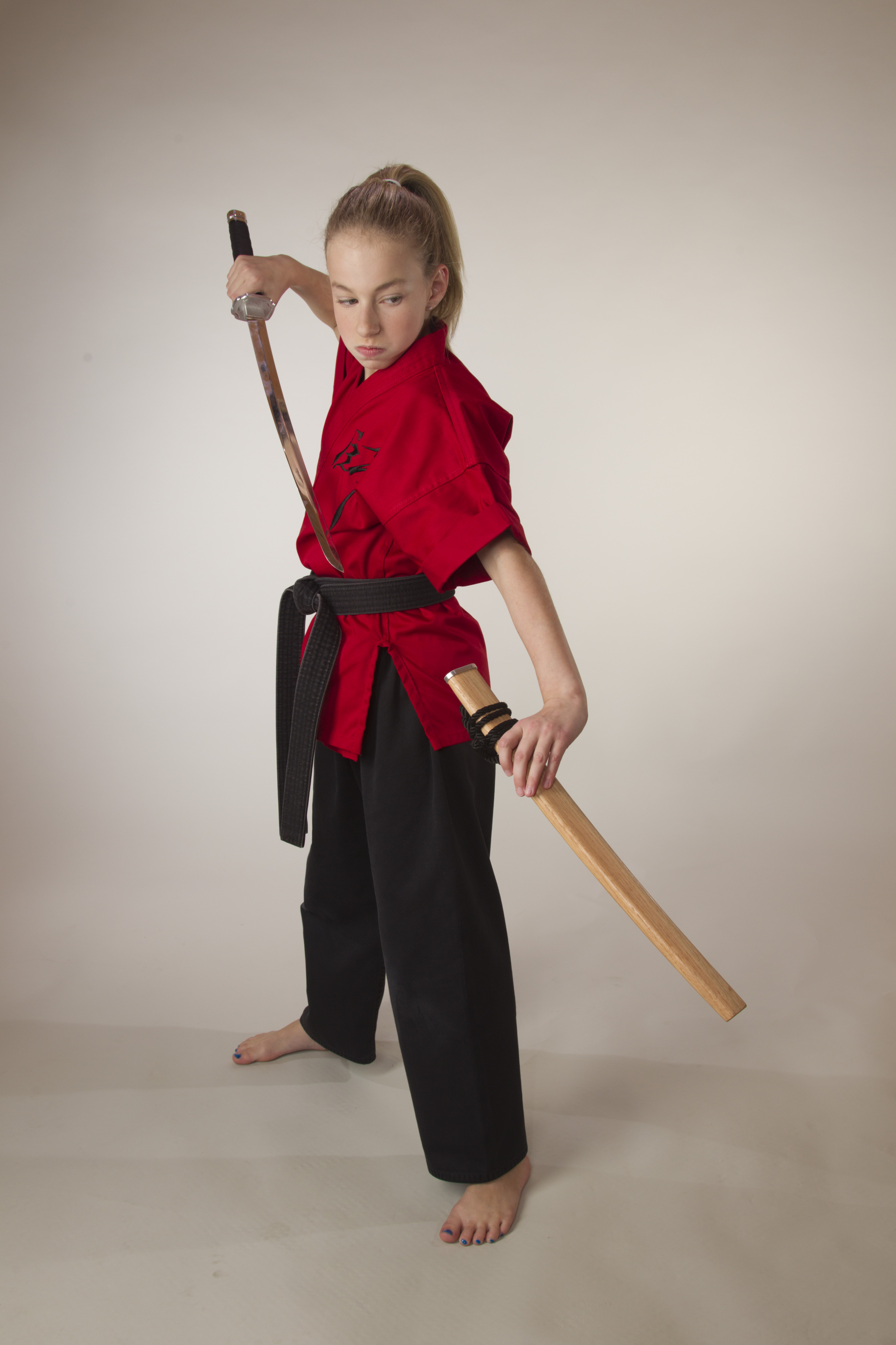 Sammy Smith, 13 time World Champion Martial Artist, proficient in the use of the sword, as well as nunchucks, kamas and Bo Staff