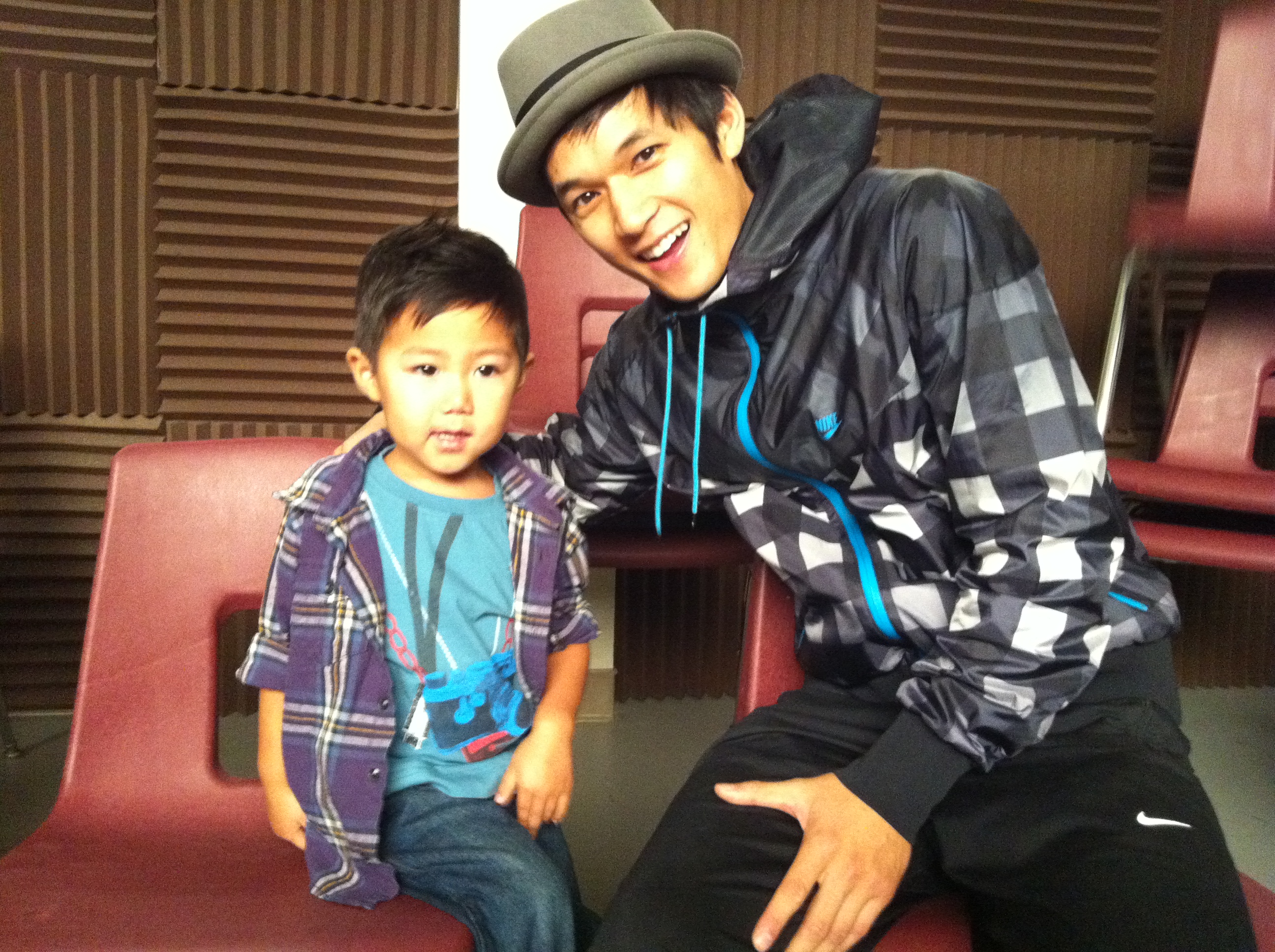 Evan Kishiyama and Harry Shum Jr. on the set of Glee