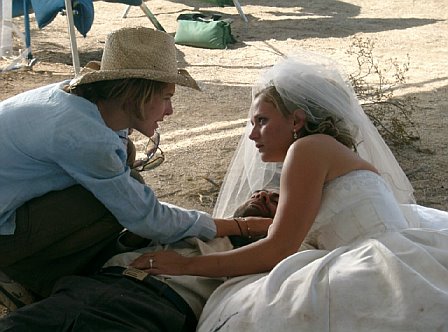 Desert Wedding director, Alexandra Fischer gives actress, Dayna Schaaf direction on set.