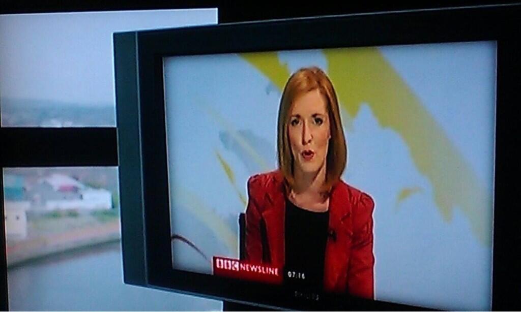 A scene from 'The Fall'. DSI Stella Gibson (Gillian Anderson) watches a news report. Newsreader - Brenda McNeill.