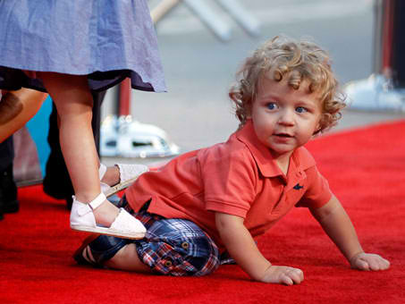 Castmember Luke Bain crawls the red carpet at the world premiere of 'The Change-Up' at the Village Theatre in Los Angeles, California on August 1, 2011.