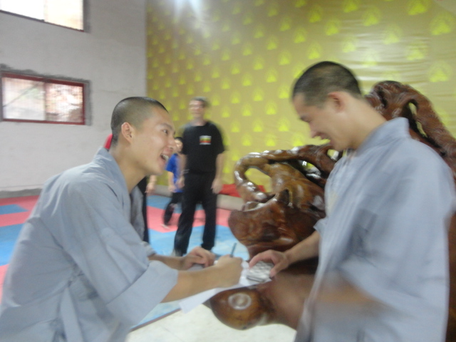 Shaolin Monks writing a message to me.