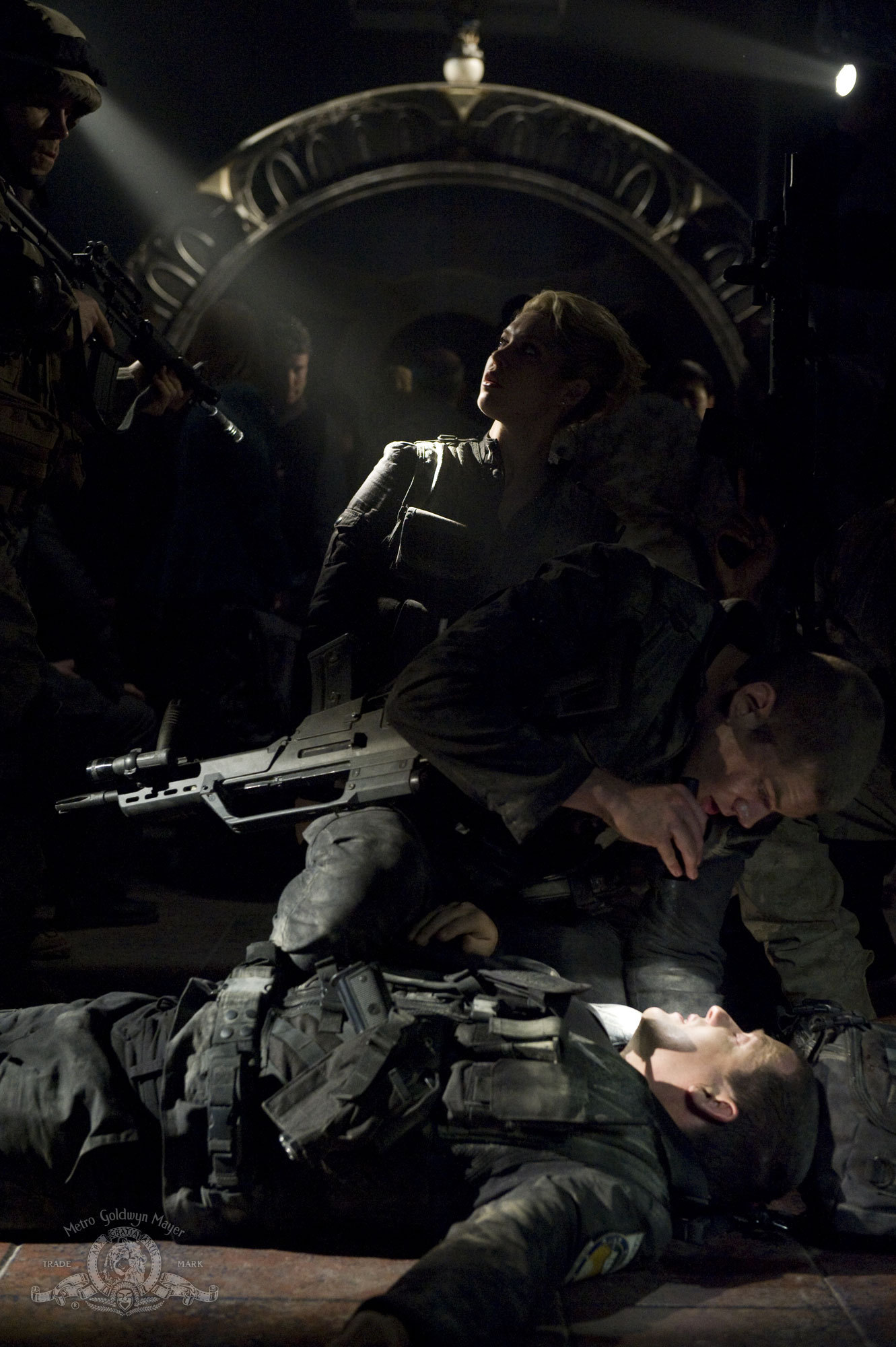 Still of Louis Ferreira, Alaina Huffman and Brian J. Smith in SGU Stargate Universe (2009)