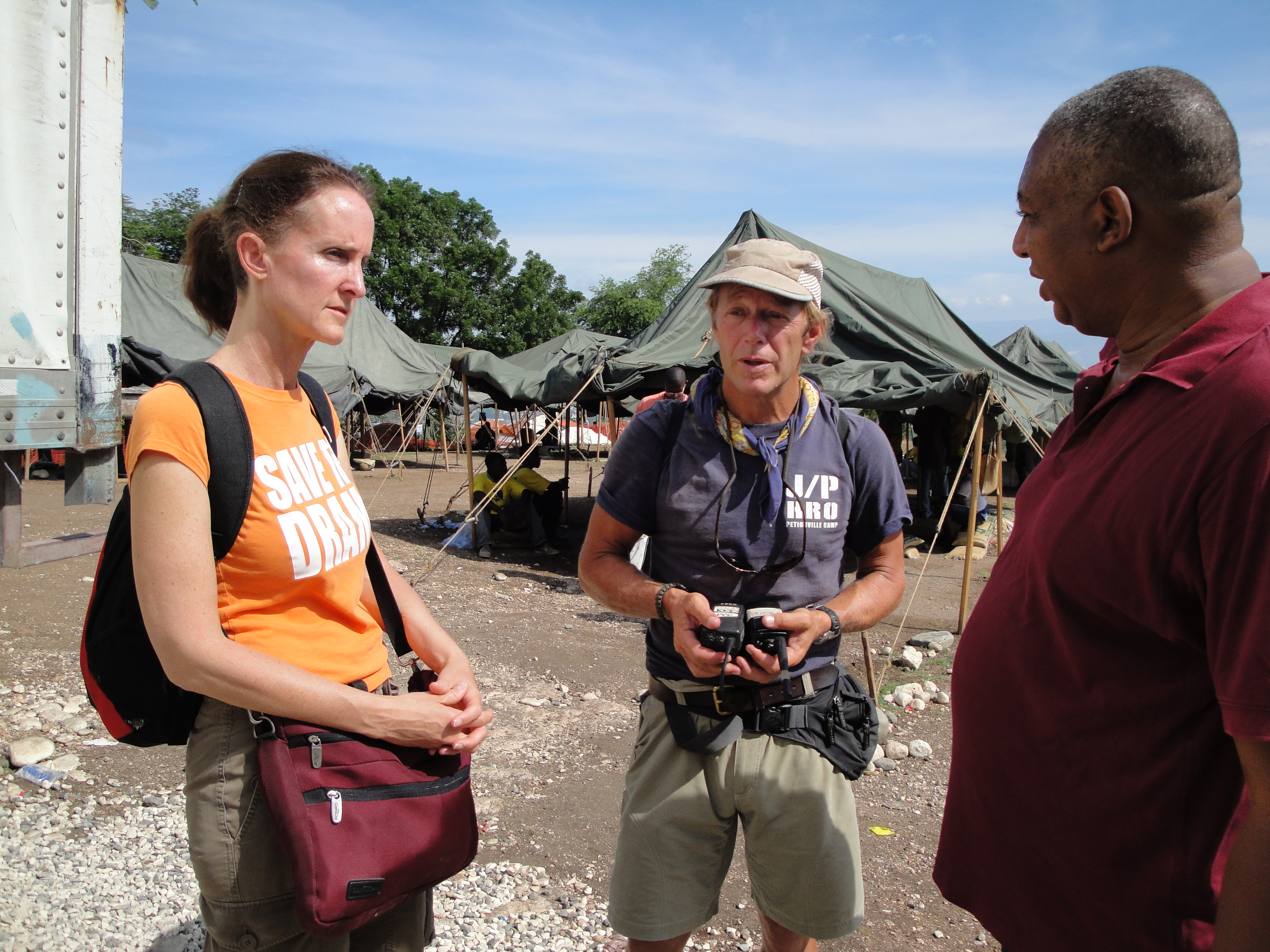 Mary Fry and Raynald Delerme filming at Sean Penn's camp (J/P HRO) in Haiti.