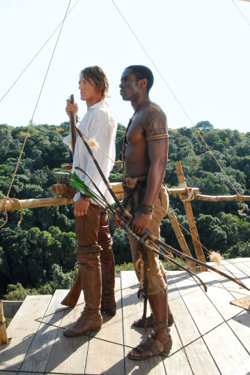 Still of Philip Winchester and Tongayi Chirisa in Crusoe (2008)