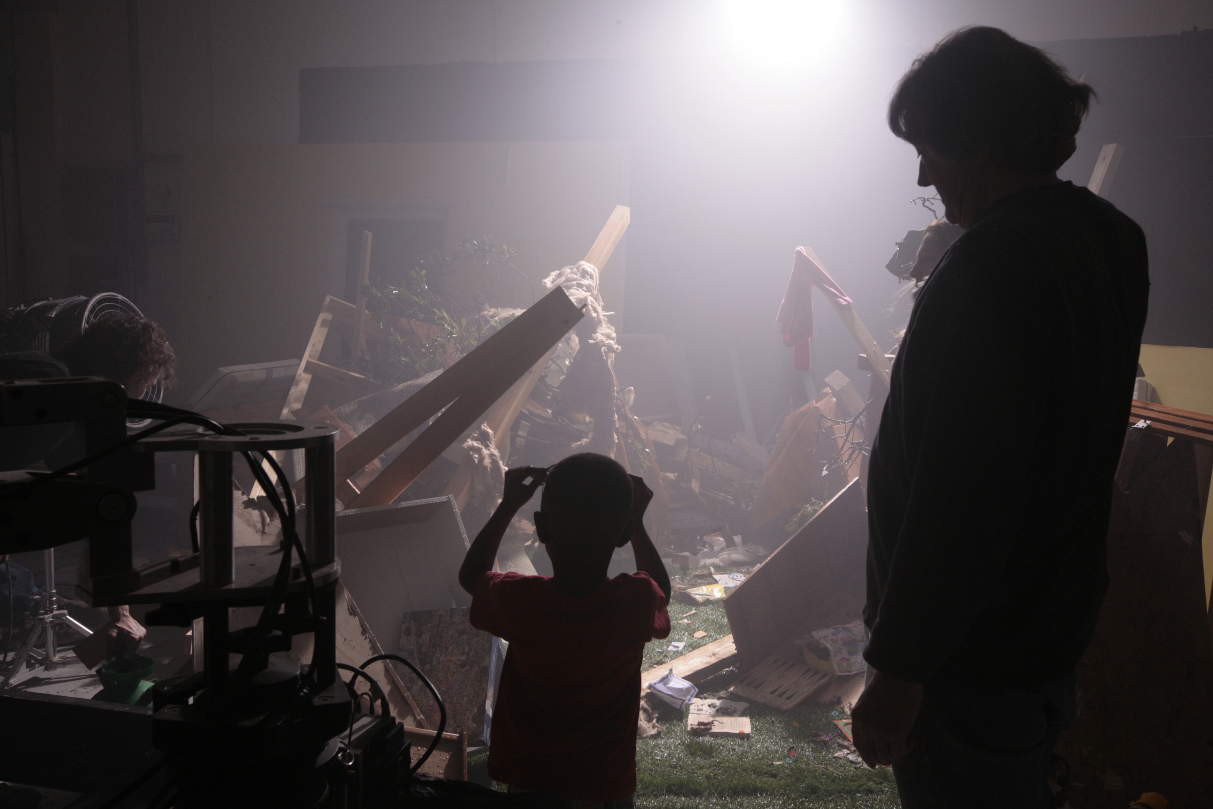 Storm City 3D. Discussing a scene of devastation with the young star.