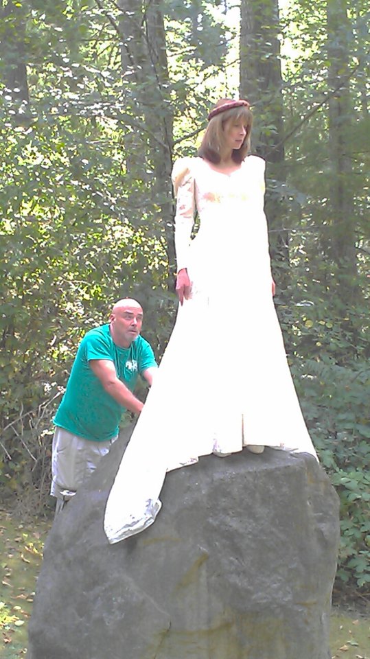 Upon a rock she stood in ballet slippers and wedding gown-must be making a movie ;)