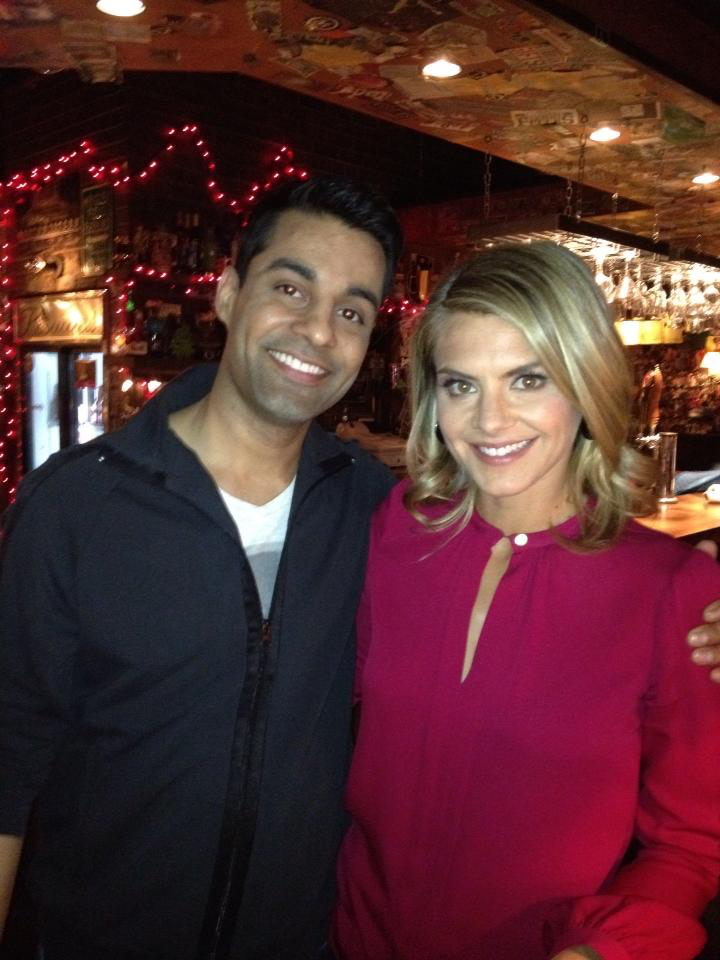 Andy Gala with Eliza Coupe on the set of ABC's Happy Endings.