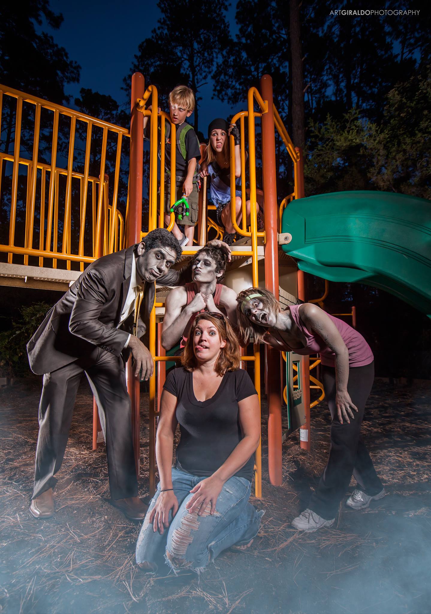 Writer/Producer Courtney Sandifer surrounded by zombies and kids from the 