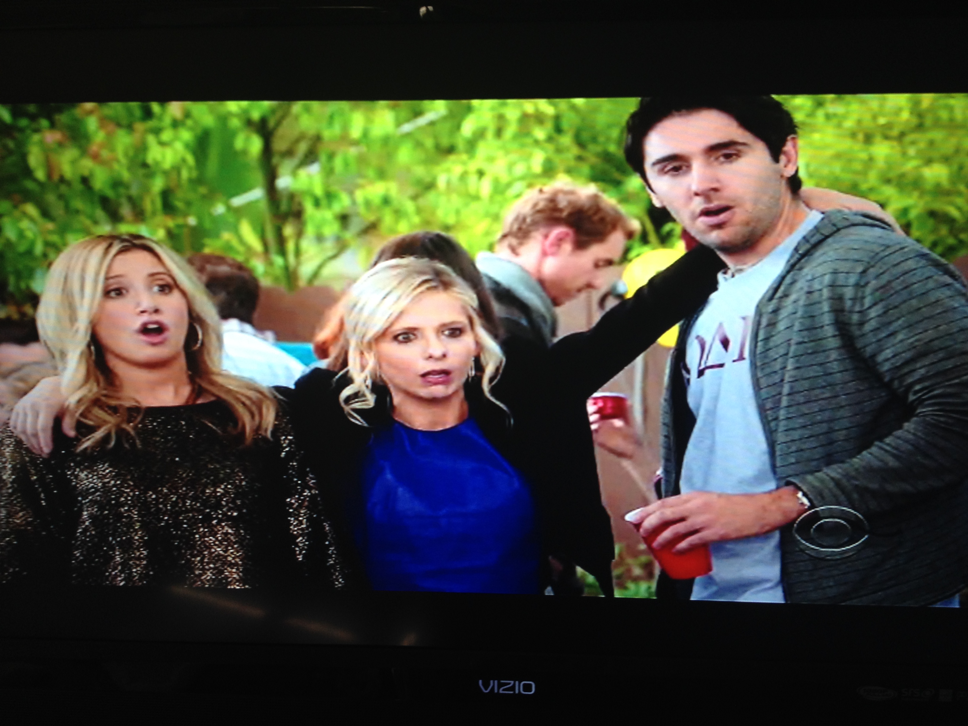 Still of Ashley Tisdale, Sarah Michelle Gellar and Daniel Rubiano in The Crazy Ones: The Intern.