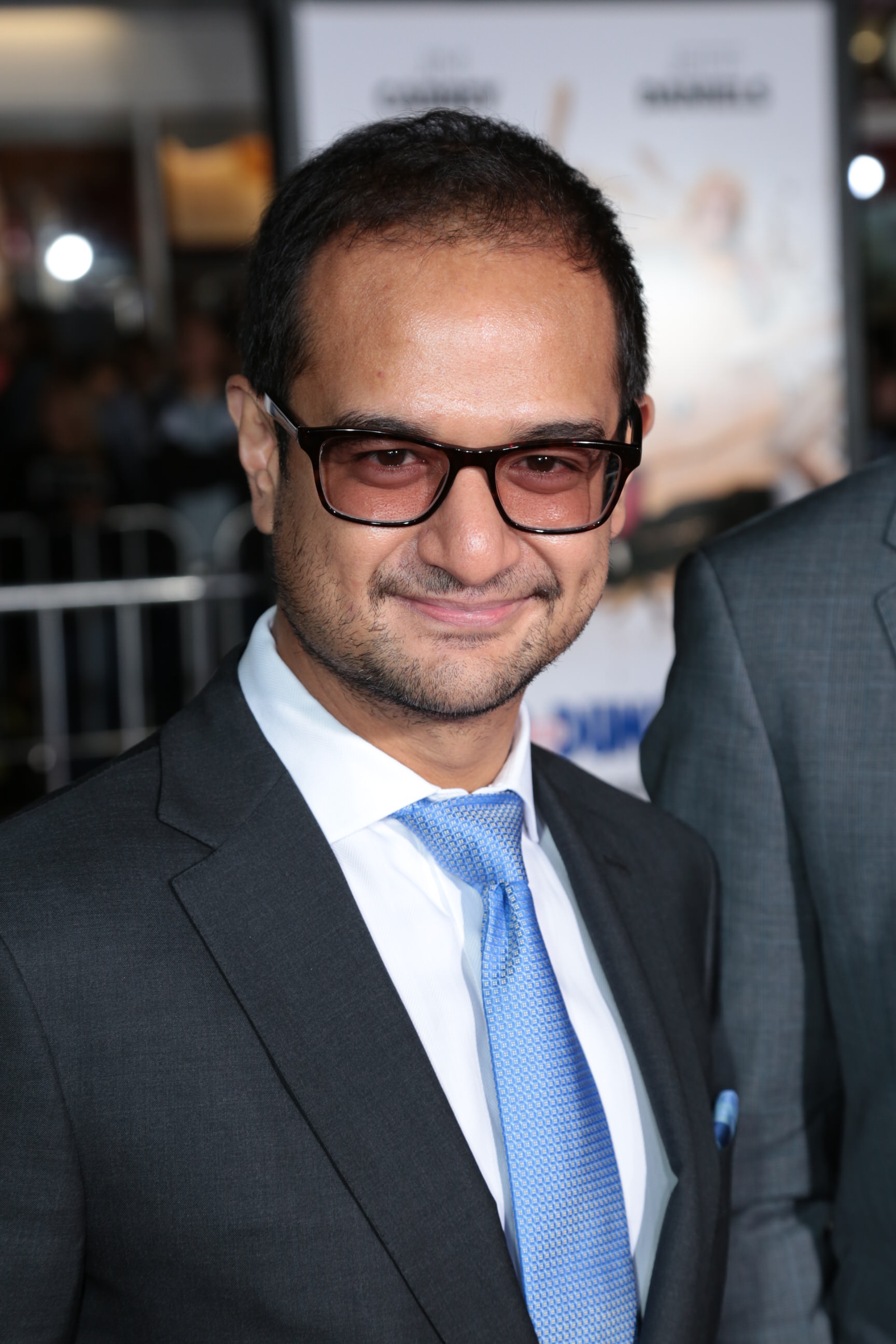 Riza Aziz at the Dumb and Dumber To Premiere in Los Angeles.