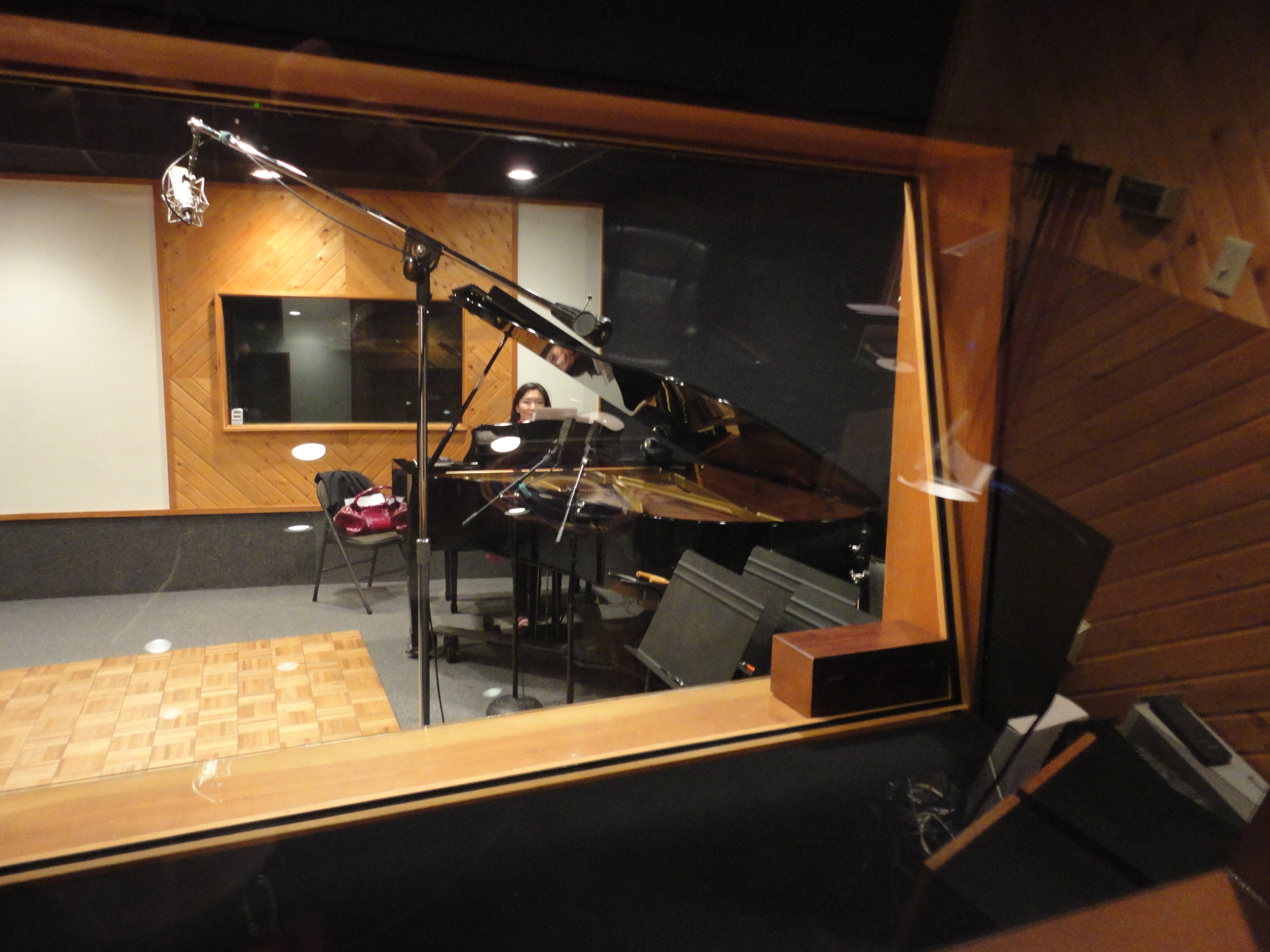 Karin Okada, composer, pianist and vocalist Recording for Disney radio CM