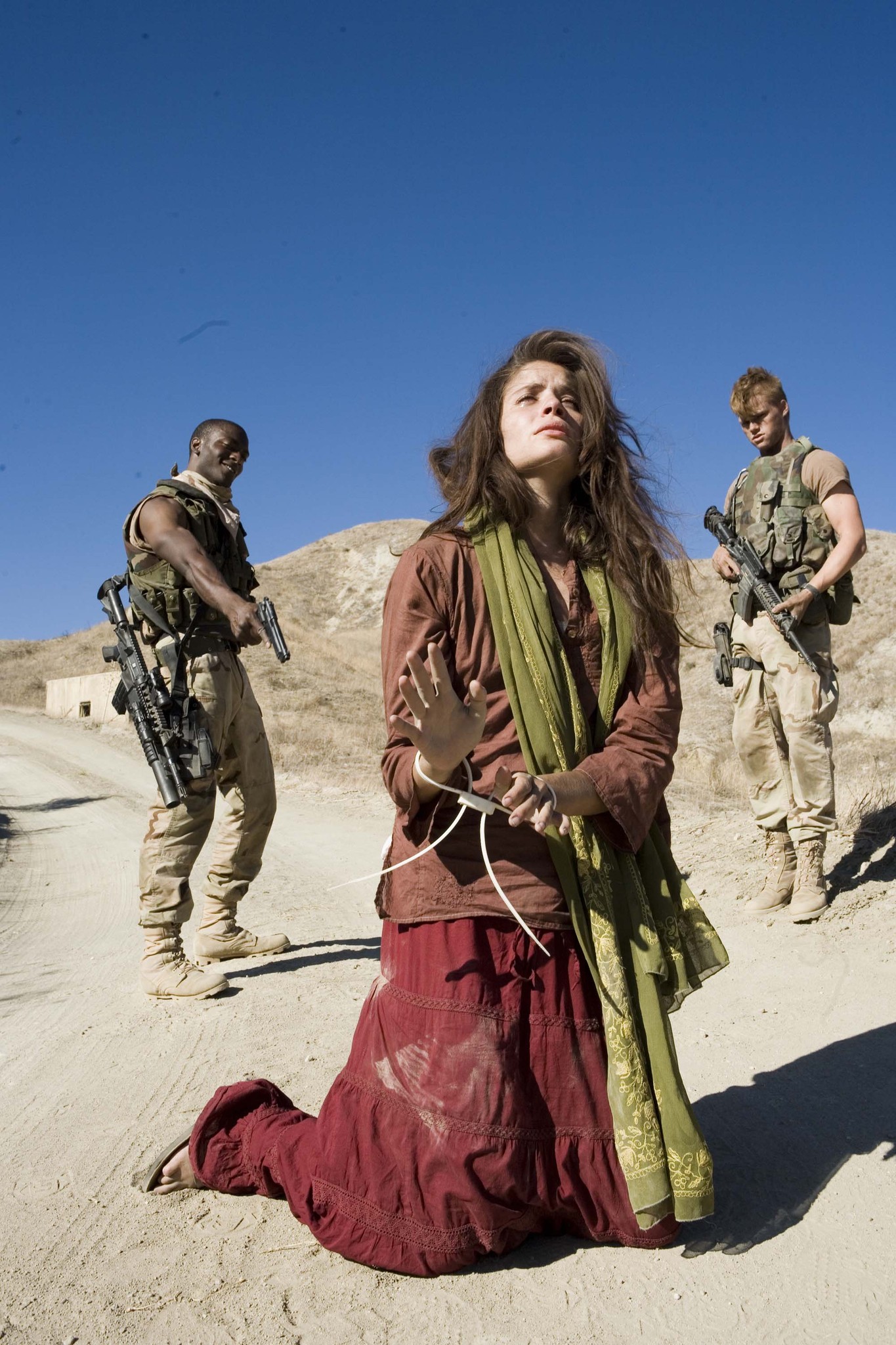 Still of Brendan Miller and Mercedes Mason in Red Sands (2009)