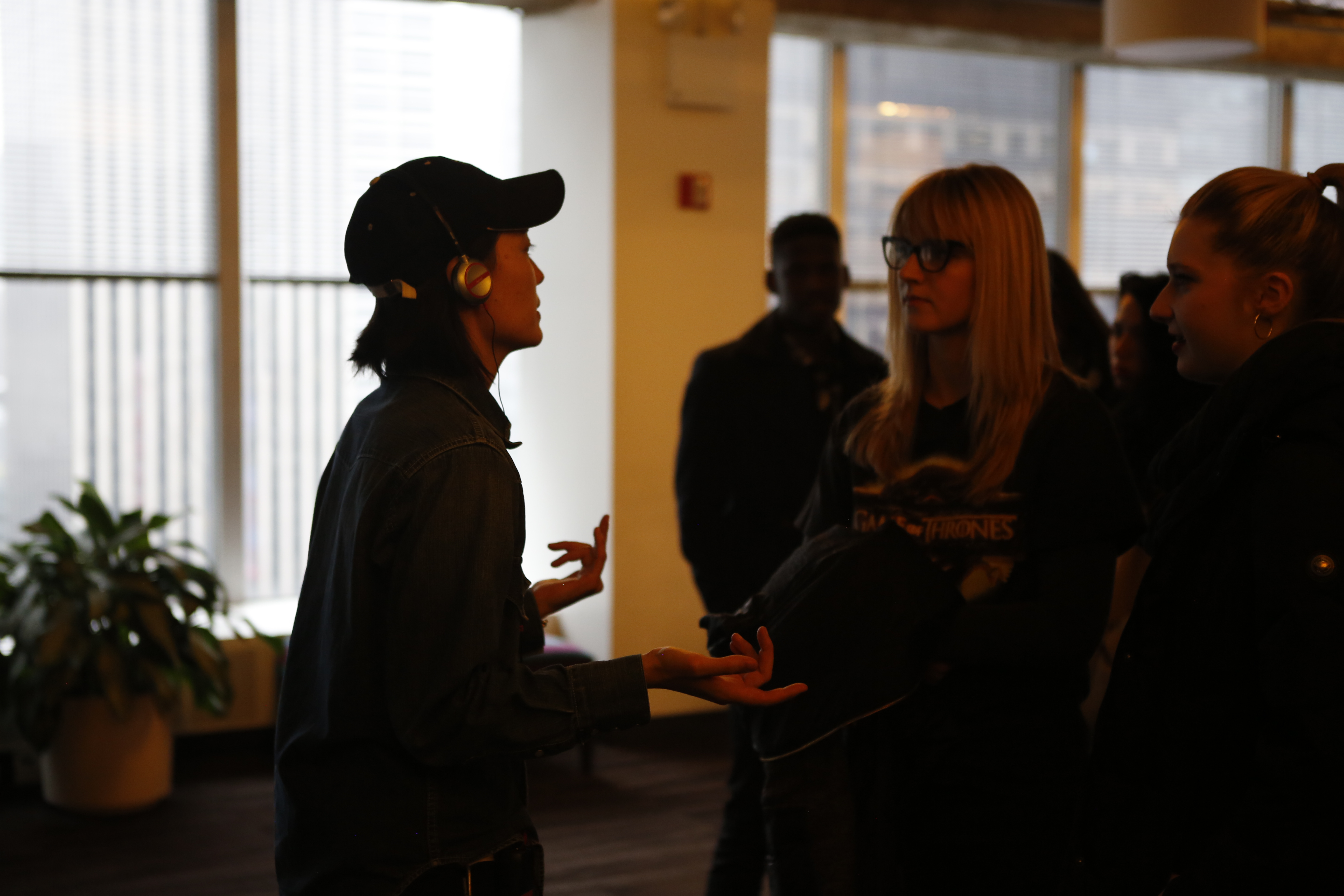 Caroline Mariko Stucky - Director of Photography, talking to actresses Julia Green & Shelby Finnie.