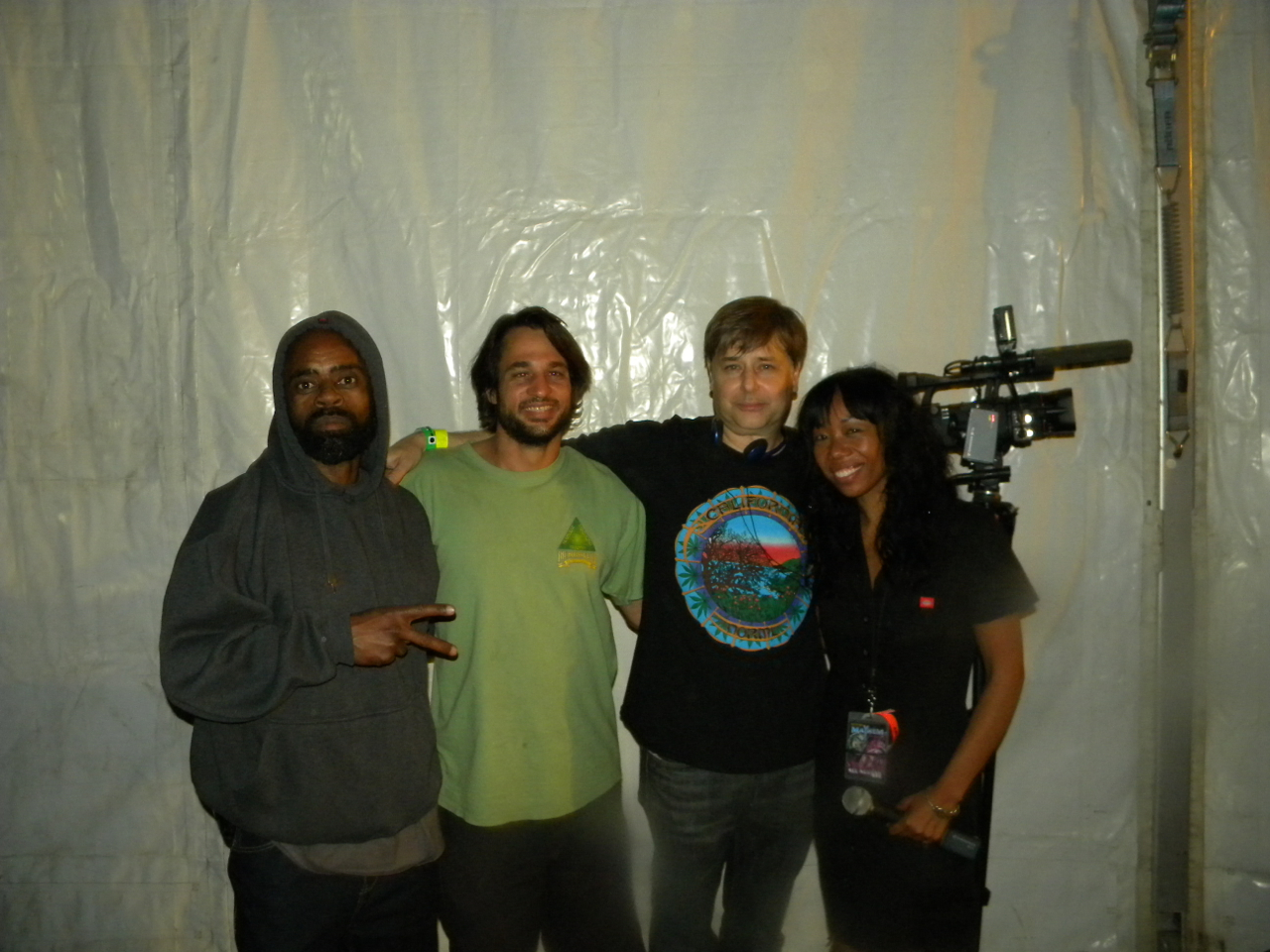 Freeway Ricky Ross, Jon Loomis, Kevin Booth, Mary Taylor filming Slipnot concert for How Weed Won the West