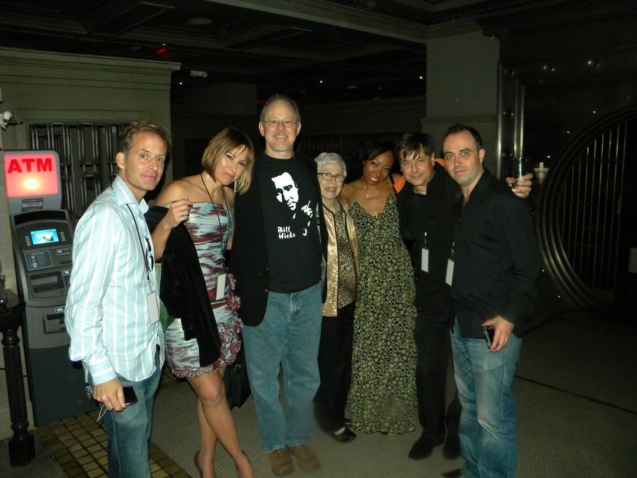 Paul Thomas, Trae Booth, Steve Hicks, Mary Hicks, Mary Taylor, Kevin Booth, Matt Harlock at the Los Angeles downtown film festival premier of American the Bill Hicks story documentary.