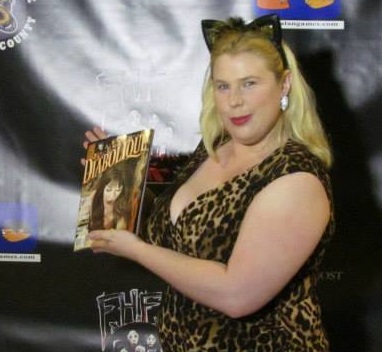 Kristin West on the red carpet at FANtastic HOrror Film Festival in San Diego, pictured with Diabolique Magazine.