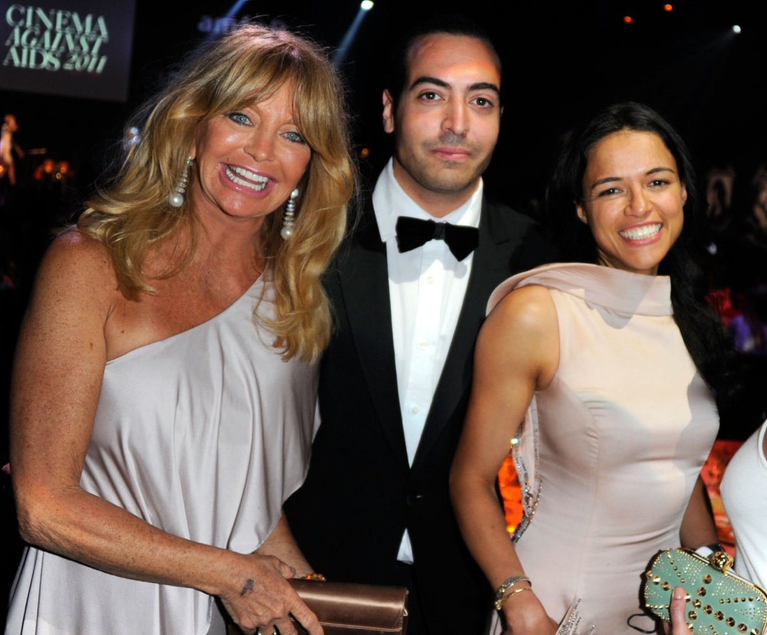 ANTIBES, FRANCE - MAY 19: Goldie Hawn, Mohammed Al Turki, and Michelle Rodriguez attend amfAR's Cinema Against AIDS Gala during the 64th Annual Cannes Film Festival at Hotel Du Cap on May 19, 2011 in Antibes, France.