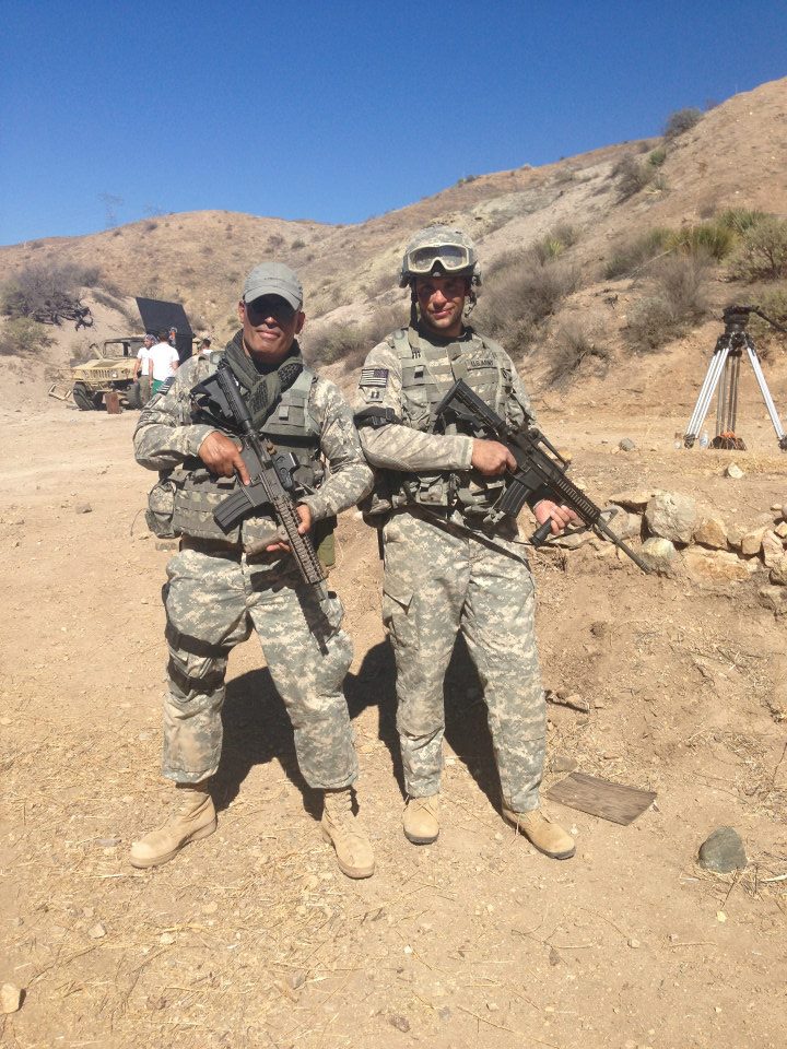 Kyle Valle taking a moment from his directing duties to pose with Christopher Loverro the radio operator and military adviser on set.